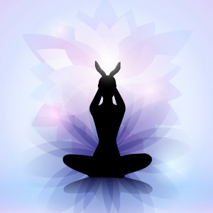 Female yoga silhouette with the lotus flower